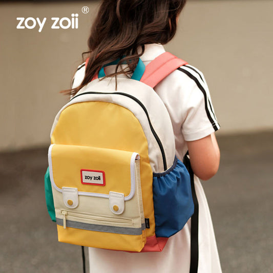 Mochila infantil Zoy Zoii color amarillo con bolsillos laterales azul y verde