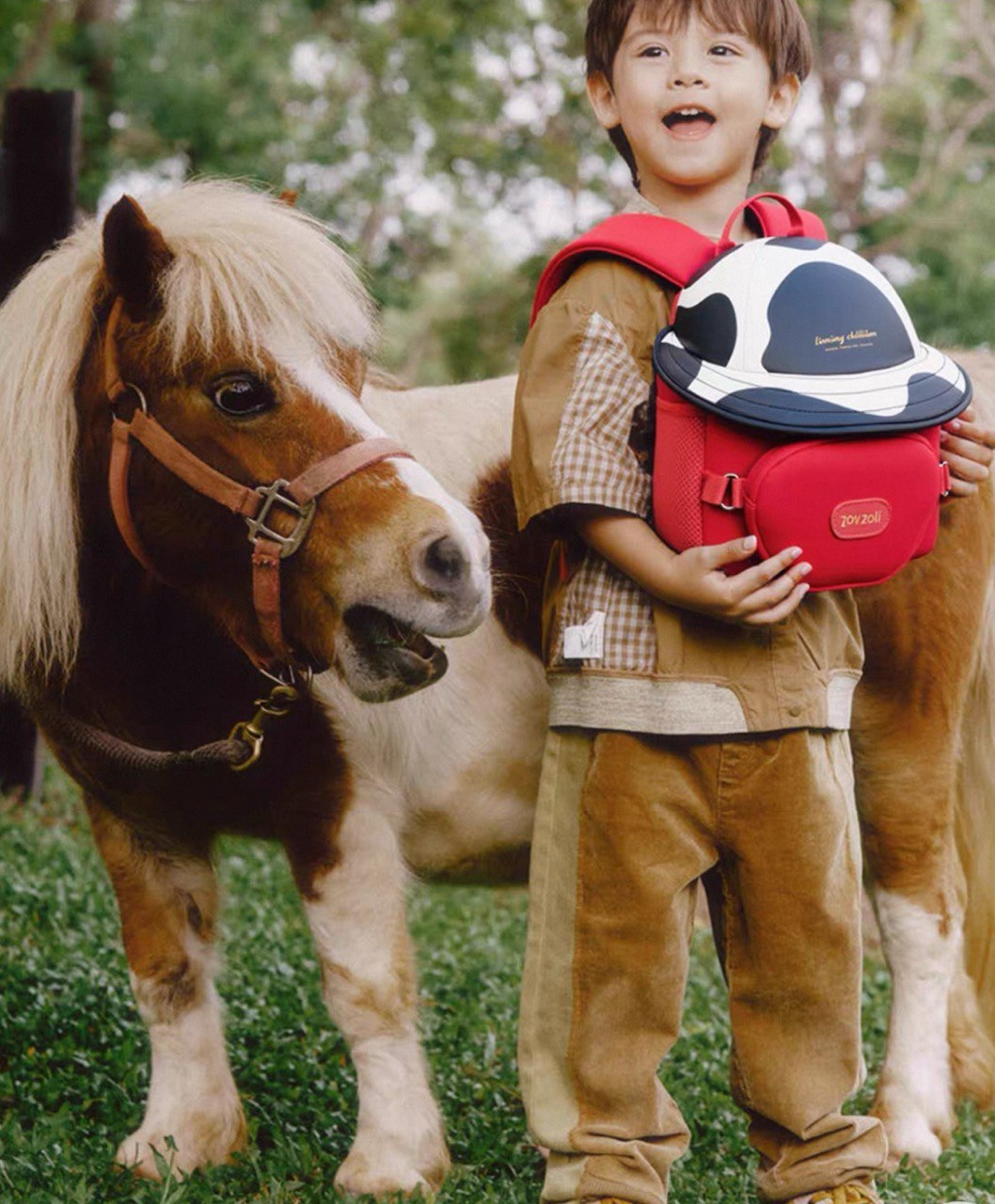 Mochila para niños diseño vaca con monedero desmontable