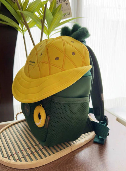Mochila infantil con diseño de piña amarilla y verde
