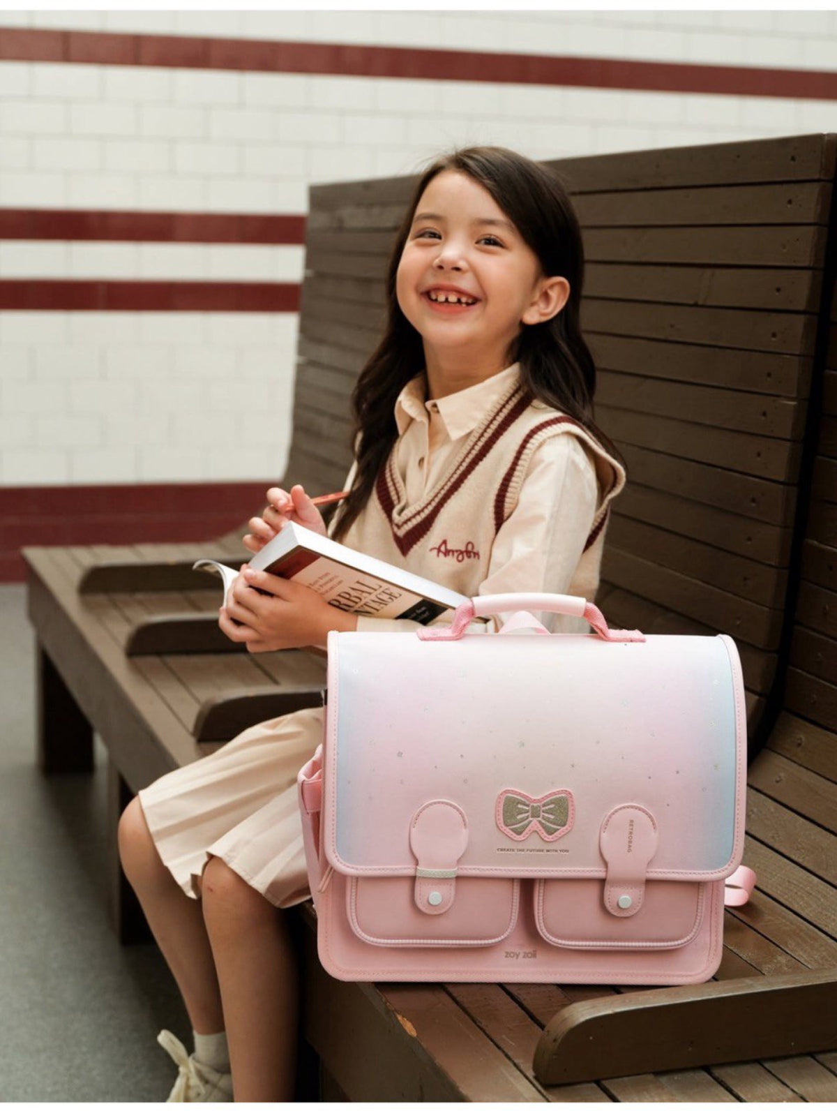 Mochila escolar Zoy Zoii rosa con lazo para niñas