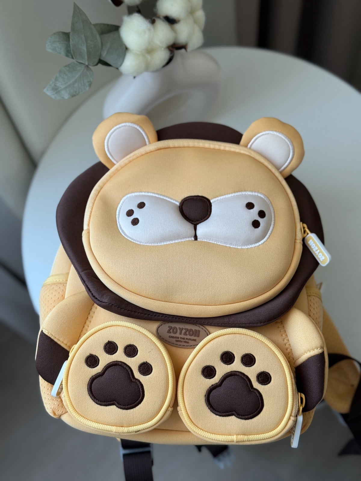 Mochila para guardería con diseño divertido de leoncito