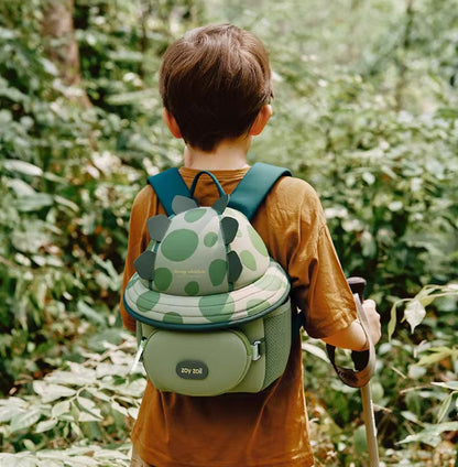 Perfil de la mochila Zoy Zoii dinosaurio con compartimento delantero y accesorios útiles