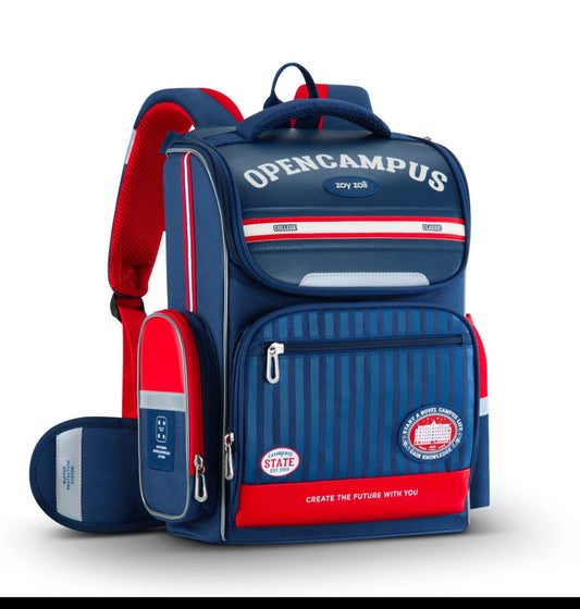Mochila escolar Zoy Zoii modelo OpenCampus en color azul marino con detalles rojos y diseño clásico, ideal para niños de primaria, cómoda y resistente para uso diario en la escuela